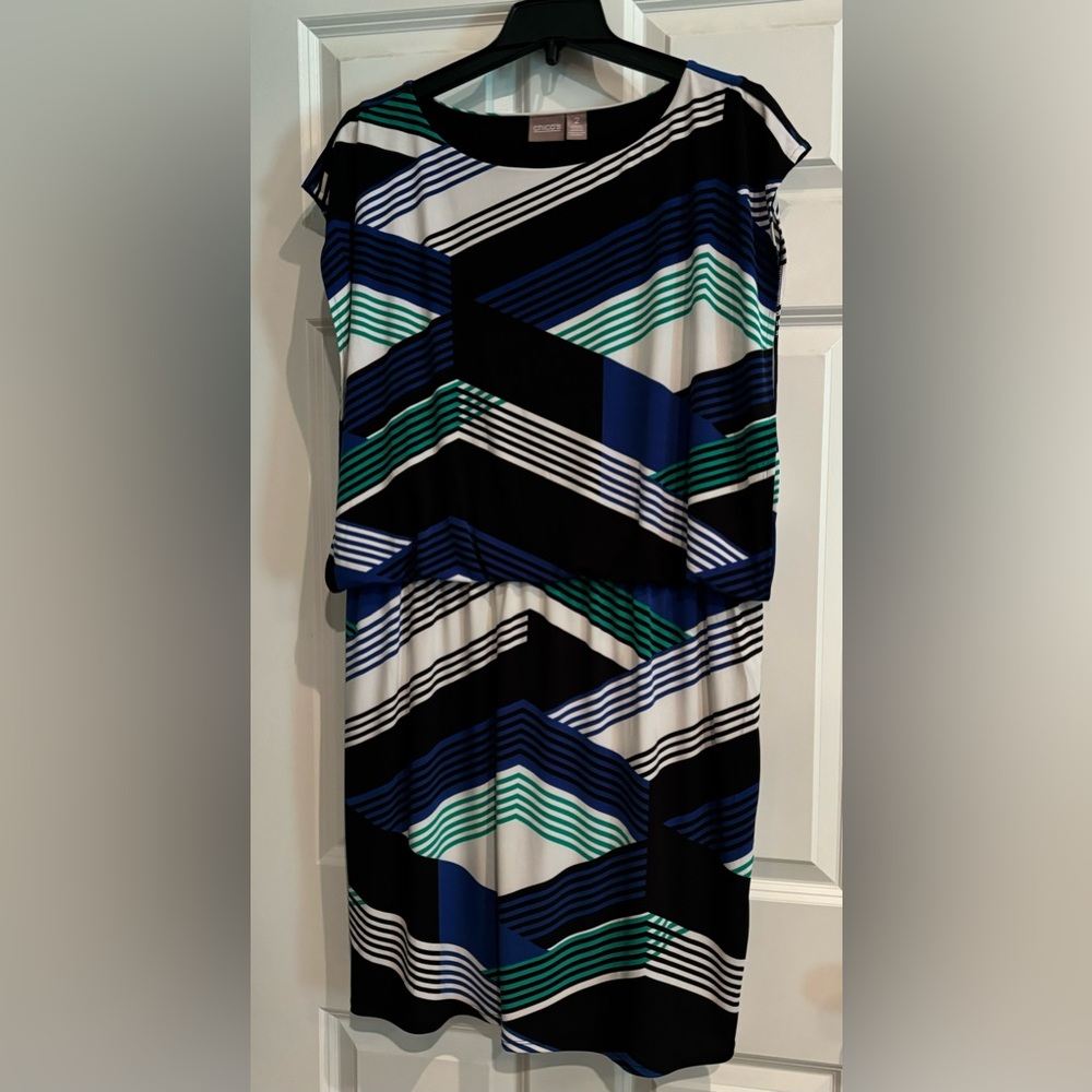 Chico’s geometric dress. So cute on!